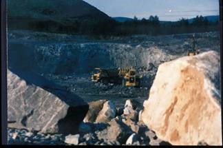 Image of an open pit mine.